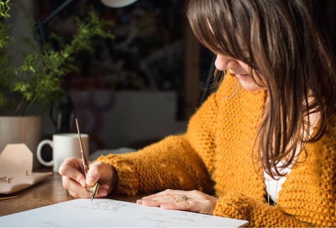 Woman writing a card