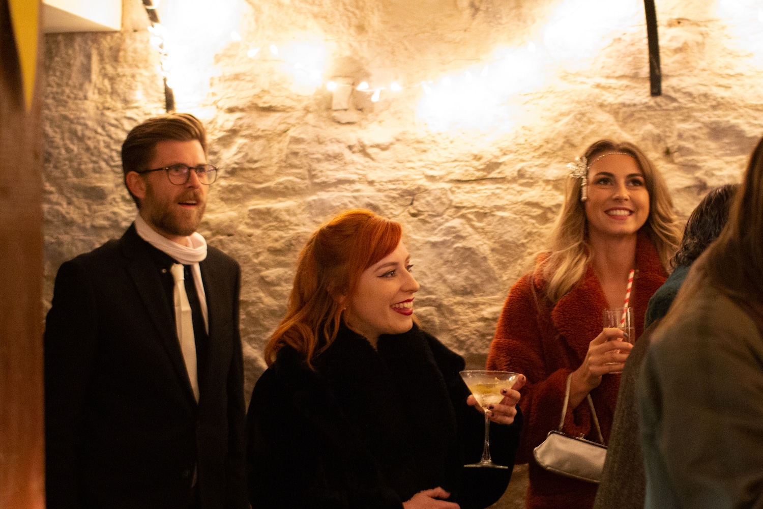 Colleagues celebrating with drinks